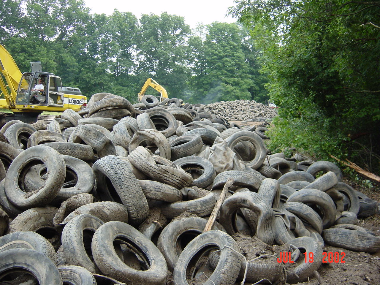 Pile of used tires at a tire recycling yard