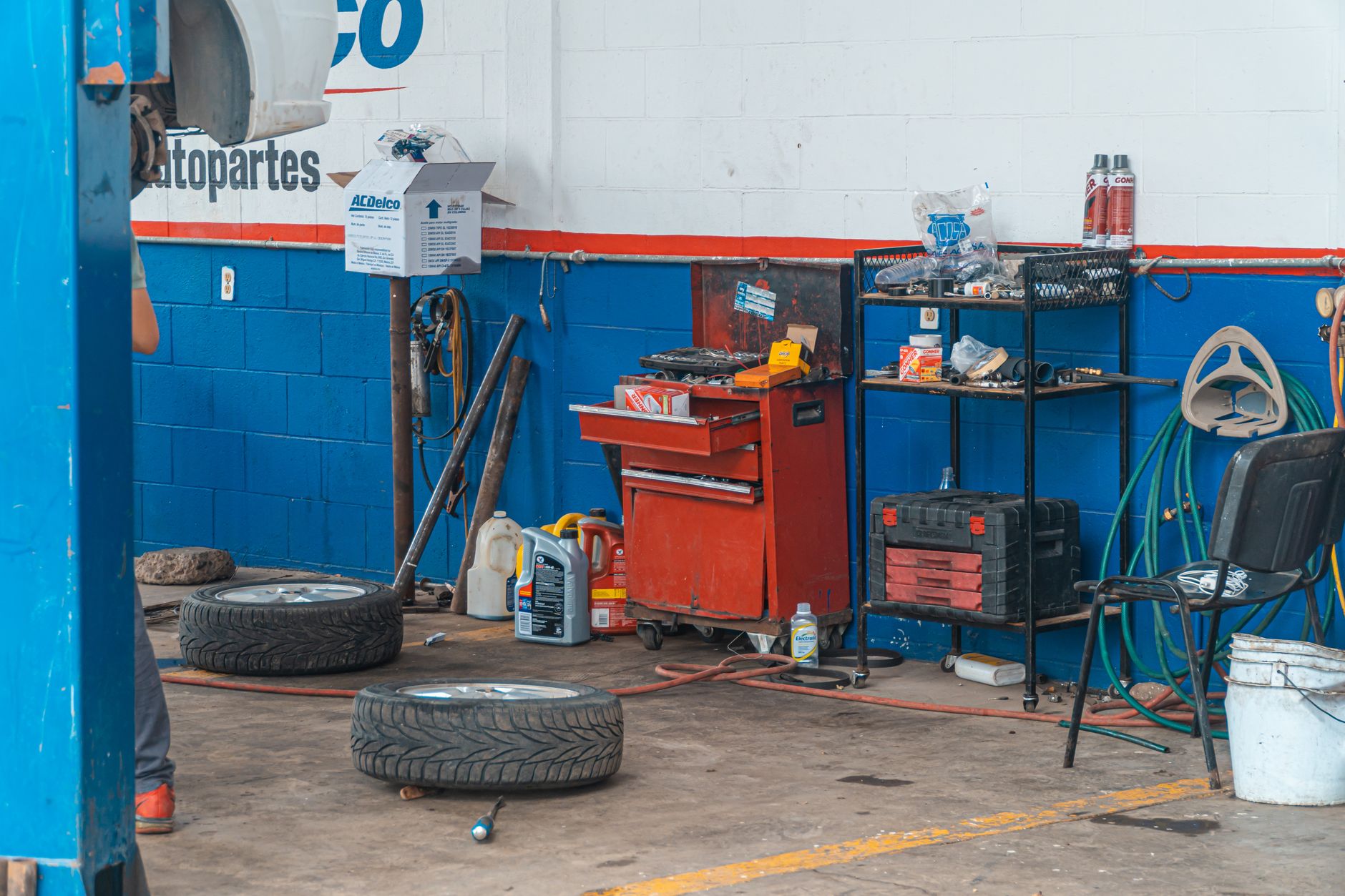 Interior of an auto repair garage with tools and equipment